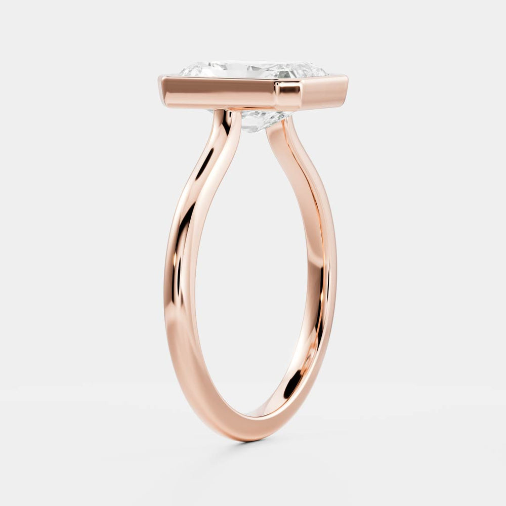 
                      
                        The Vienna Ring - Radiant Bezel Solitaire
                      
                    