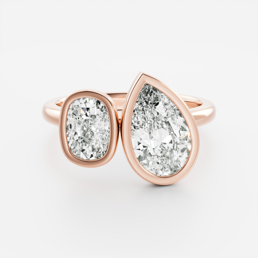 
                      
                        The Anaïs Ring - Elongated Cushion and Pear Bezel Toi et Moi
                      
                    