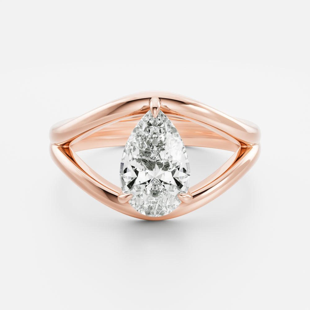 
                      
                        The Elise Ring - Split Shank Pear Solitaire
                      
                    