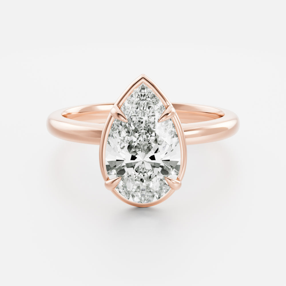 
                      
                        The Sophia Ring - Pear Georgian Solitaire
                      
                    
