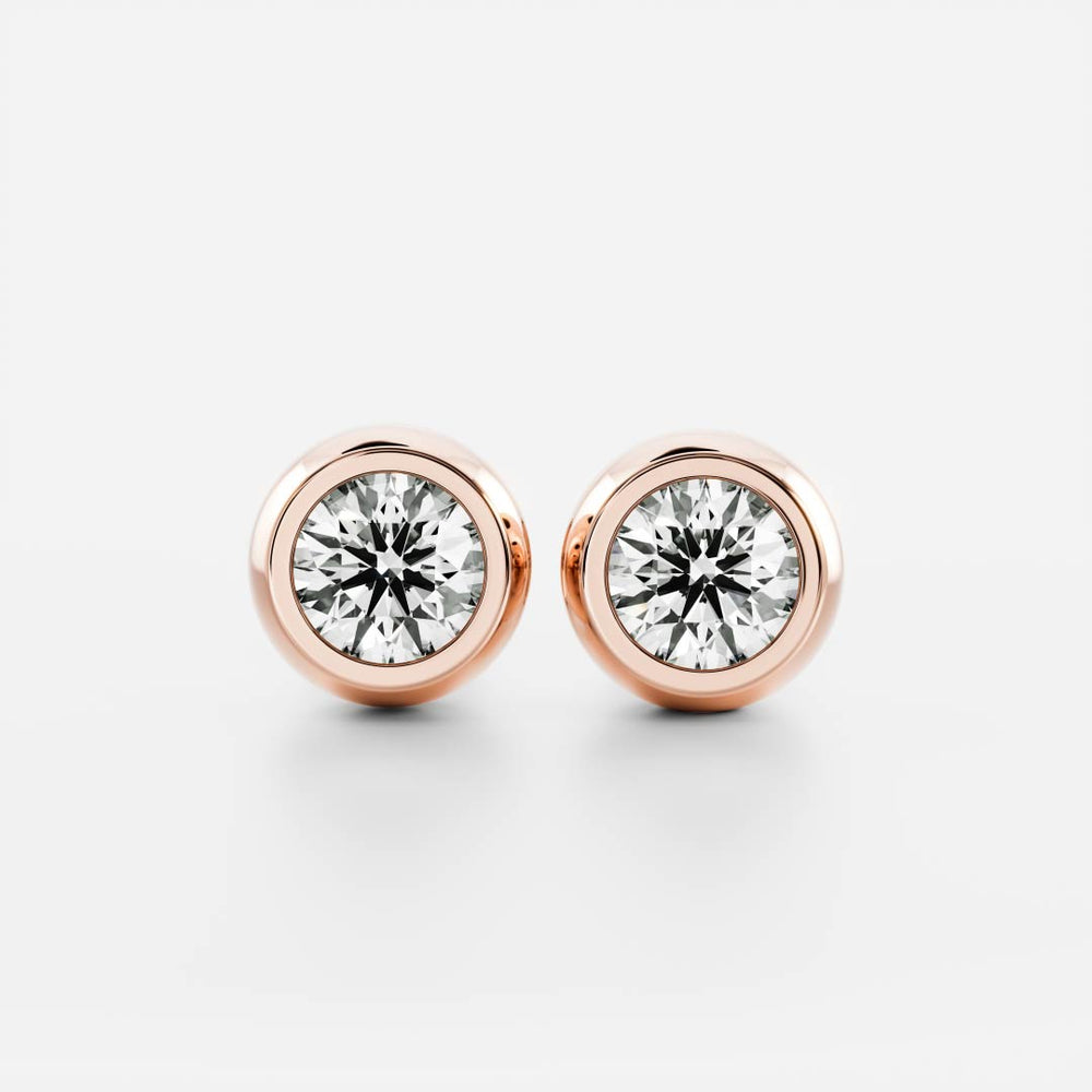 
                      
                        The Vera Earrings - Round Bezel Studs
                      
                    