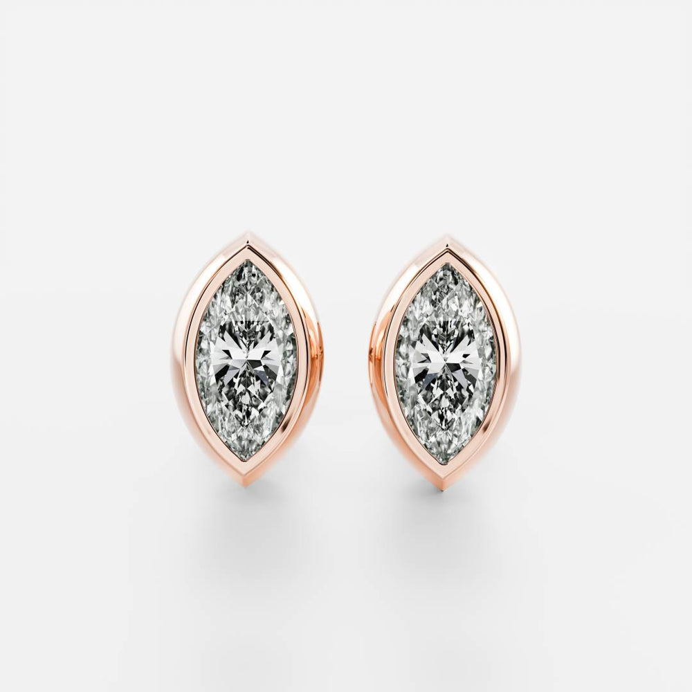 
                      
                        The Vera Earrings - Marquise Bezel Studs
                      
                    