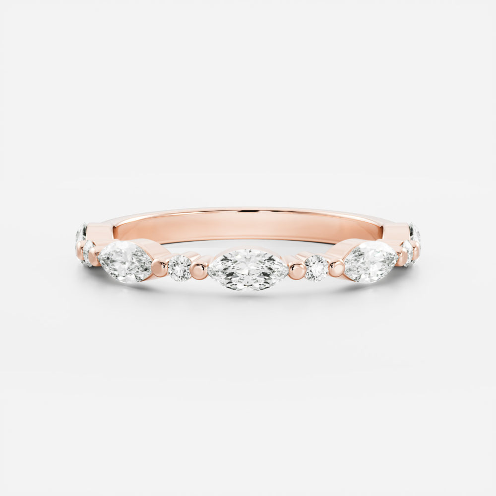 
                      
                        The Freya Ring - Marquise and Round Brilliant Band
                      
                    