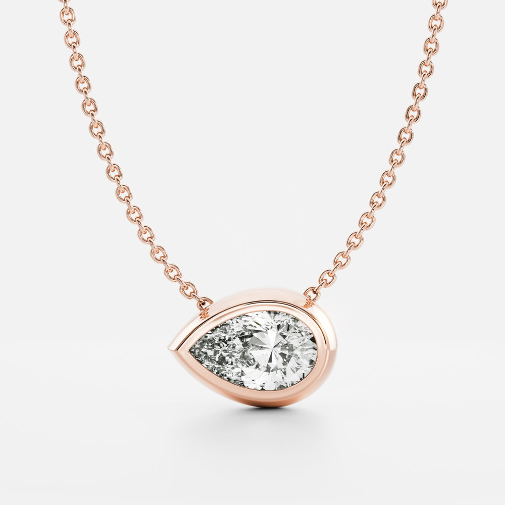 
                      
                        The Vera Necklace - Pear Bezel Pendant
                      
                    