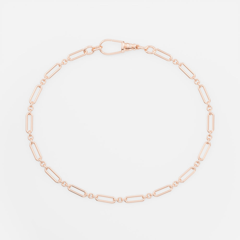 
                      
                        The Paperclip Figaro Bracelet
                      
                    