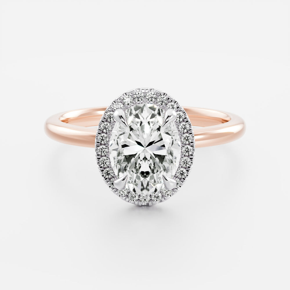 
                      
                        The Luise Ring™ - Oval Halo
                      
                    