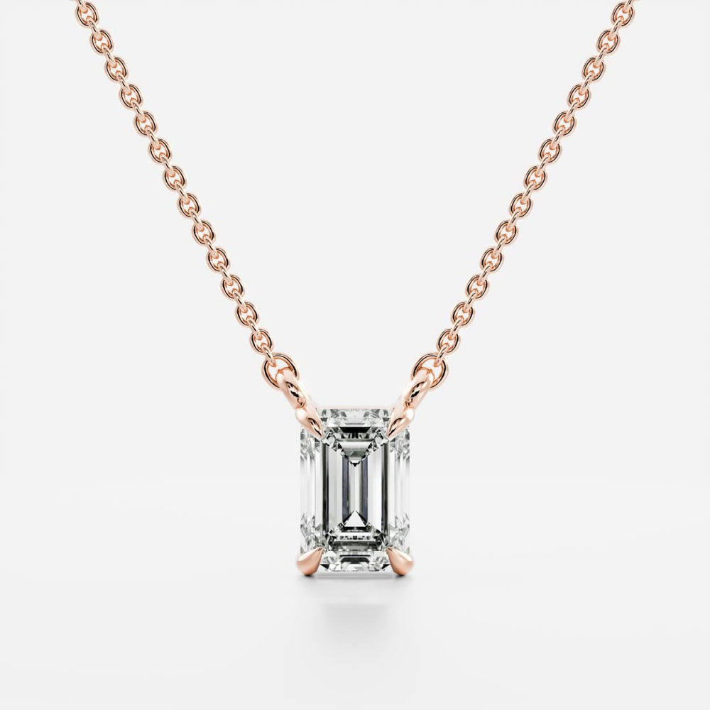 
                      
                        The Iris Necklace - Emerald Pendant
                      
                    