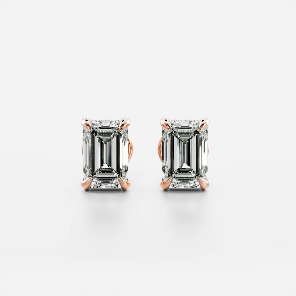 
                      
                        The Iris Earrings - Emerald Studs
                      
                    