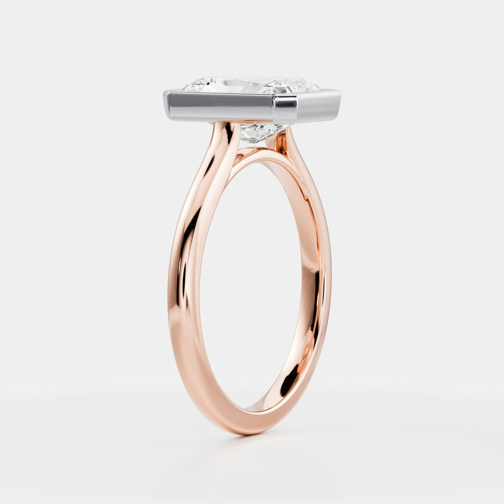 
                      
                        The Vienna Ring - Radiant Bezel Solitaire
                      
                    