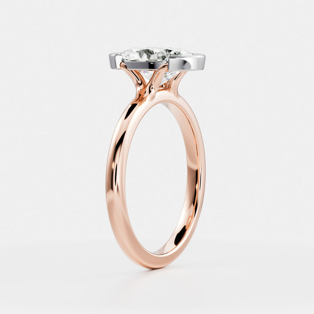 
                      
                        The Luise Ring - Oval Half Bezel Solitaire
                      
                    