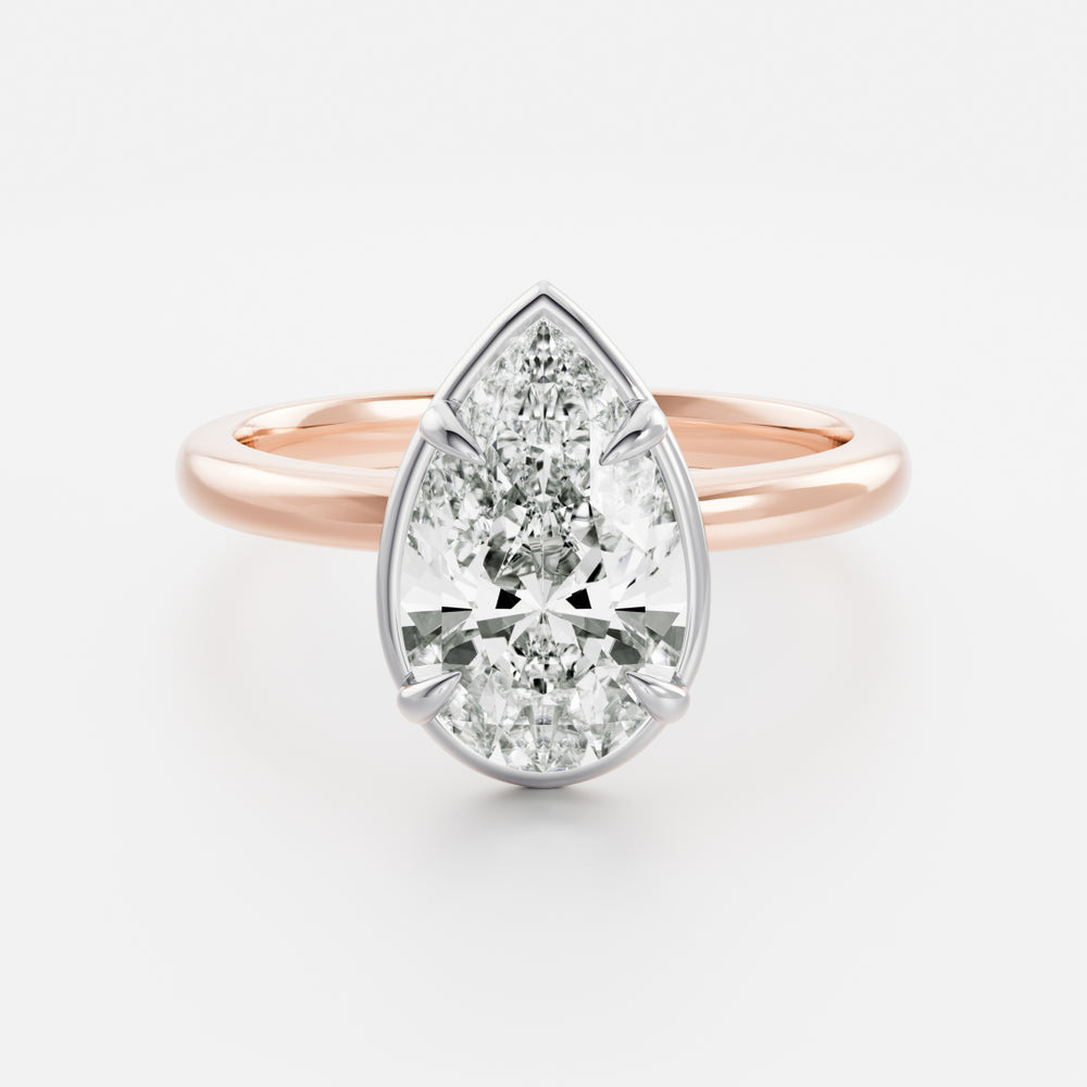 
                      
                        The Sophia Ring - Pear Georgian Solitaire
                      
                    