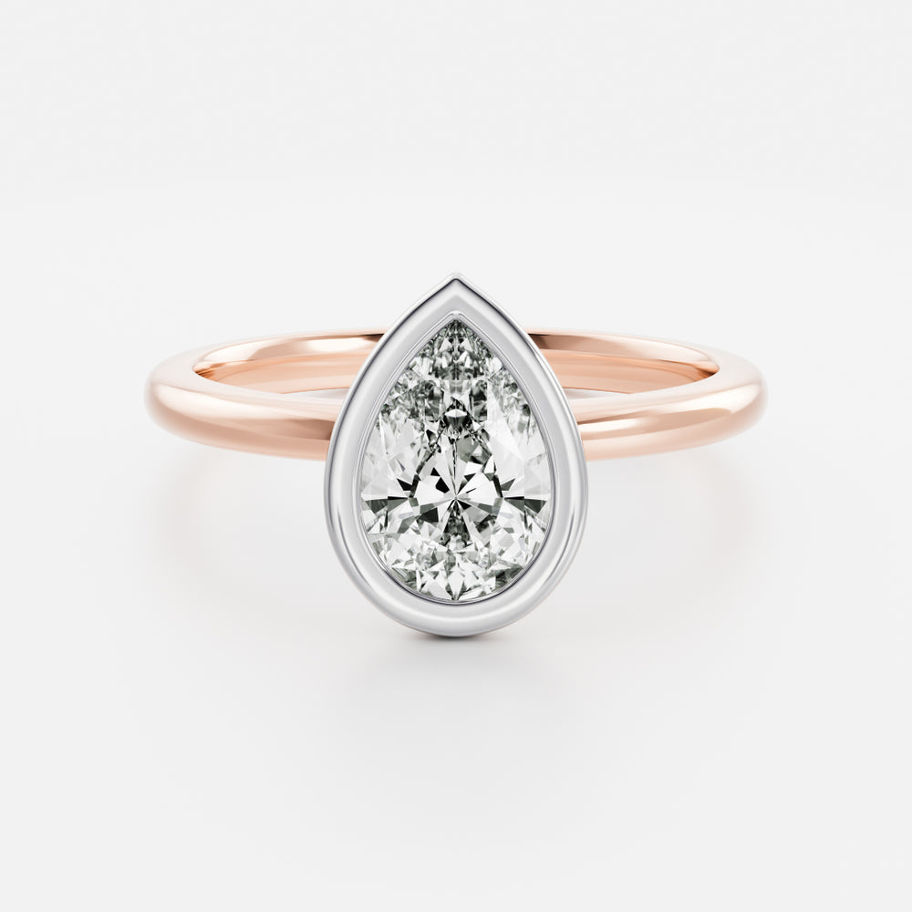 
                      
                        The Sophia Ring - Pear Bezel Solitaire
                      
                    