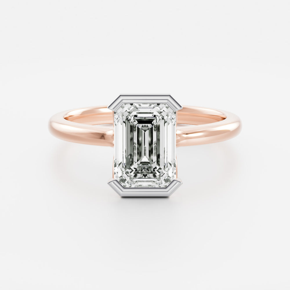 
                      
                        The Audrey Ring - Emerald Half Bezel Solitaire
                      
                    