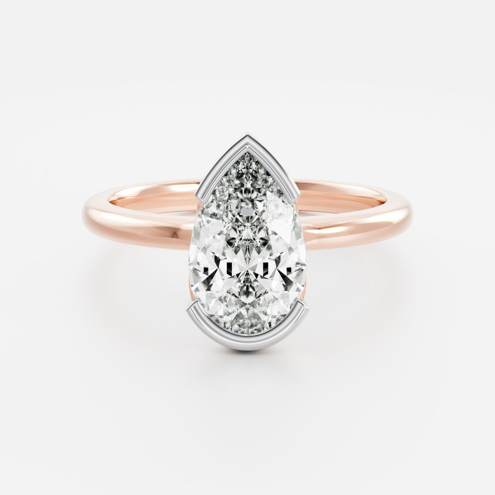 
                      
                        The Sophia Ring - Pear Half Bezel Solitaire
                      
                    