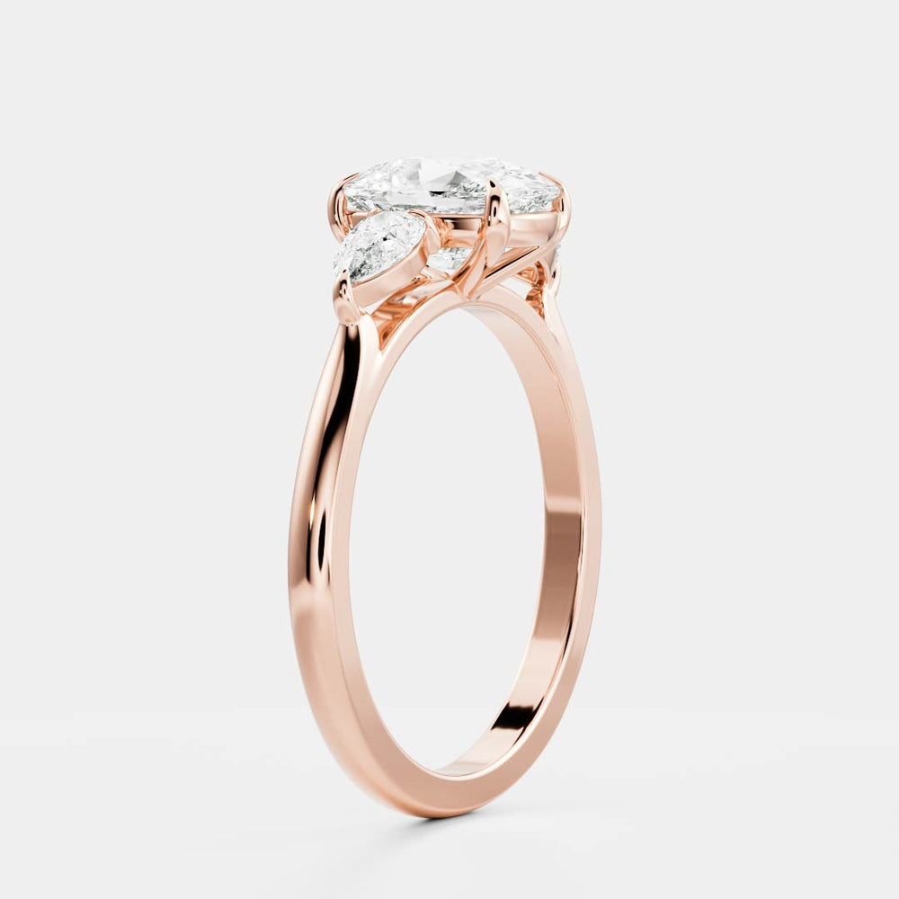 
                      
                        The Florence Ring - Elongated Cushion & Pear Trilogy
                      
                    