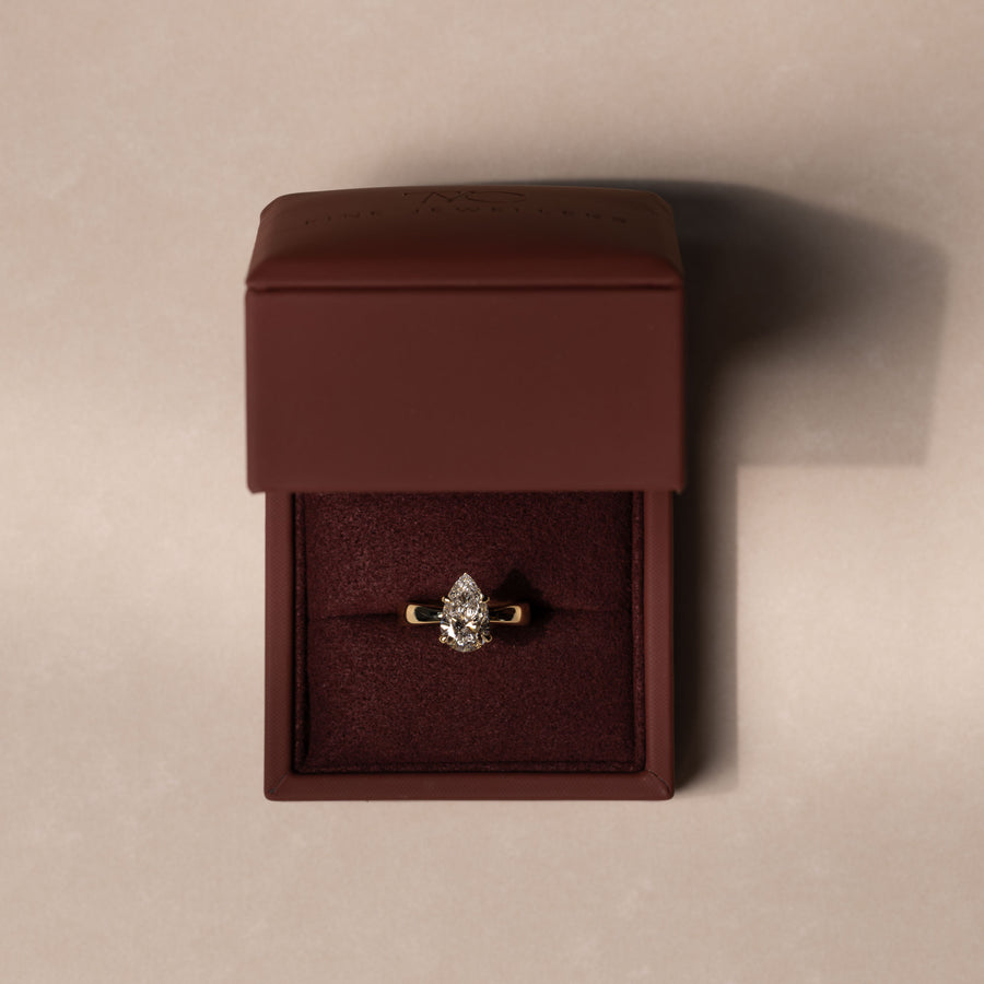The Amalia Ring - Pear Tapered Solitaire