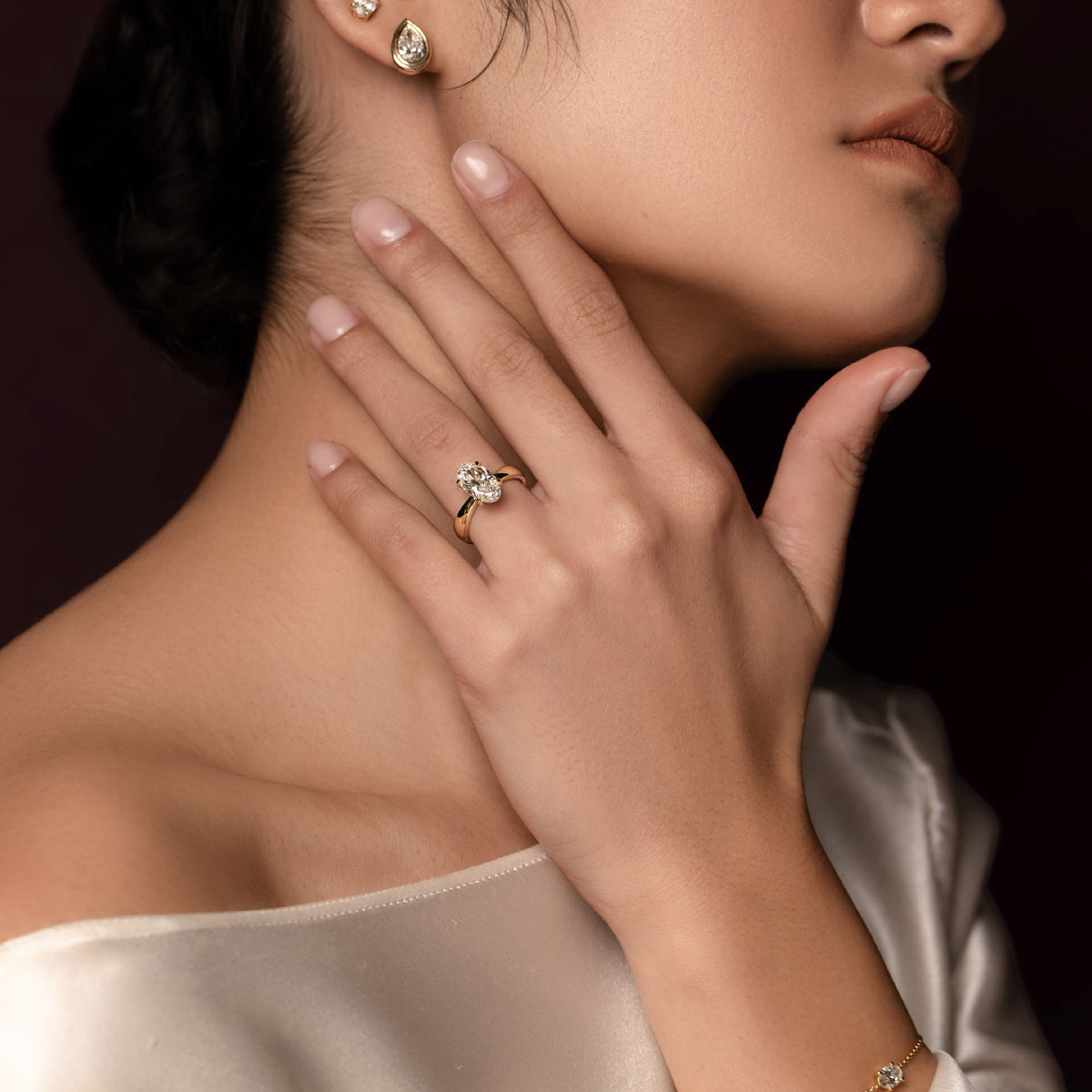 The Amalia Ring - Moval Tapered Solitaire