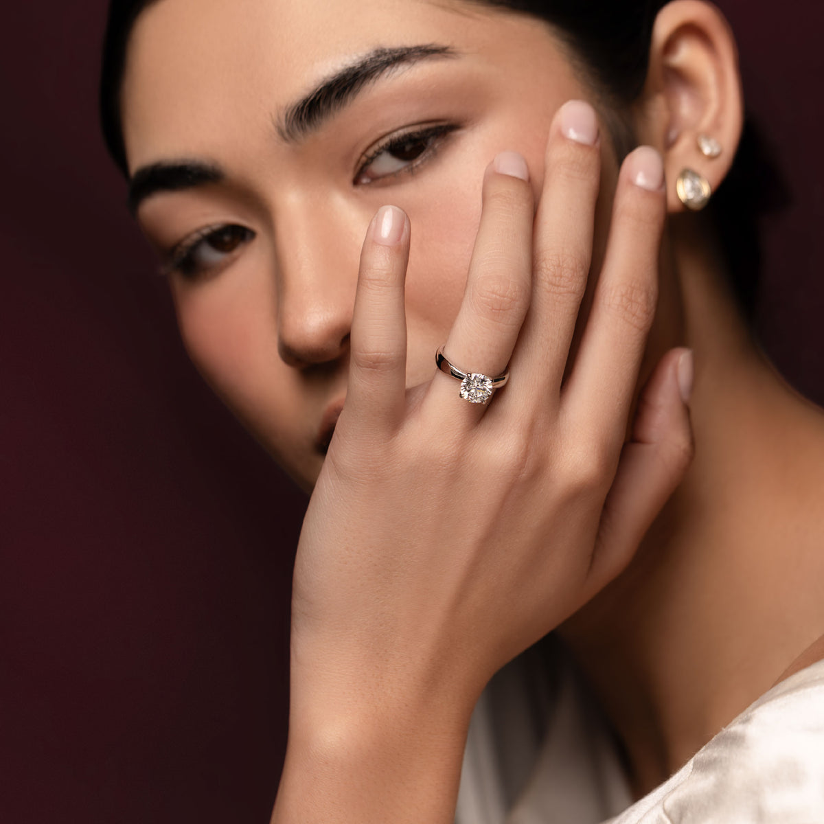 The Amalia Ring - Round Tapered Solitaire