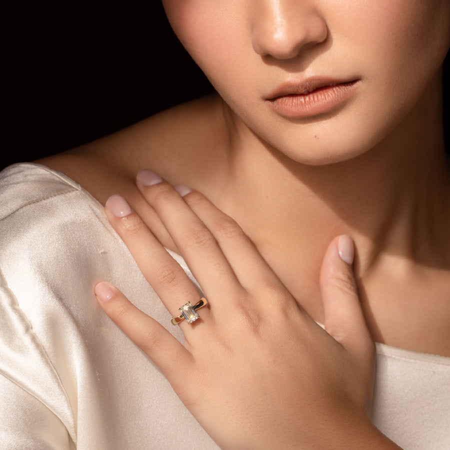 The Amalia Ring - Emerald Tapered Solitaire