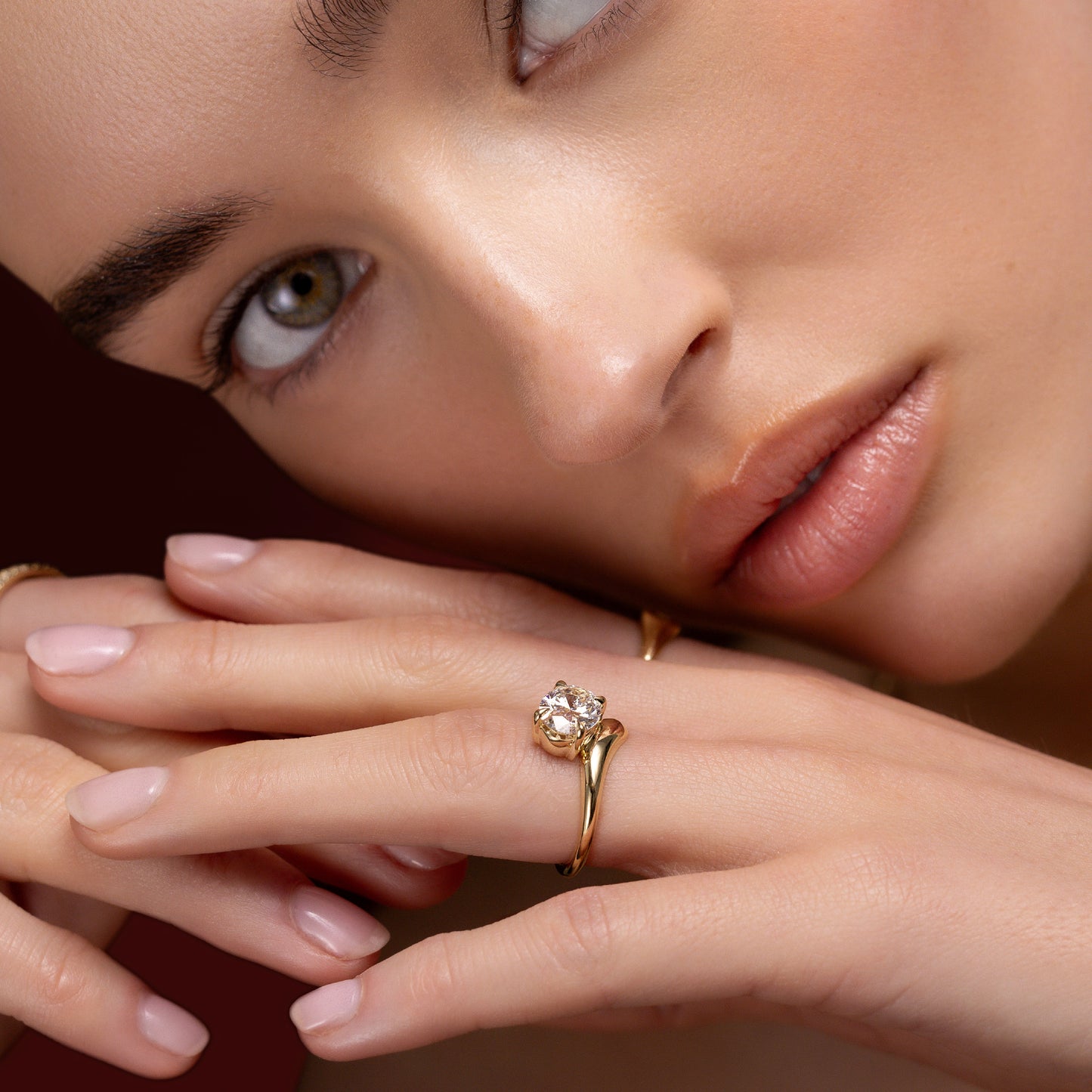 The Sarina Ring - Floating Oval Solitaire with Twisted Band