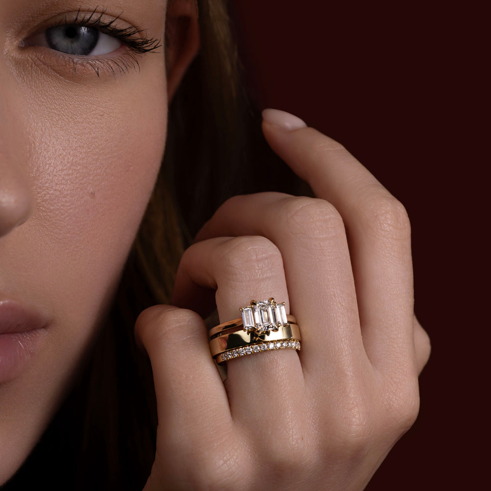 
                      
                        The Viola Ring - Emerald & Baguette Trilogy
                      
                    