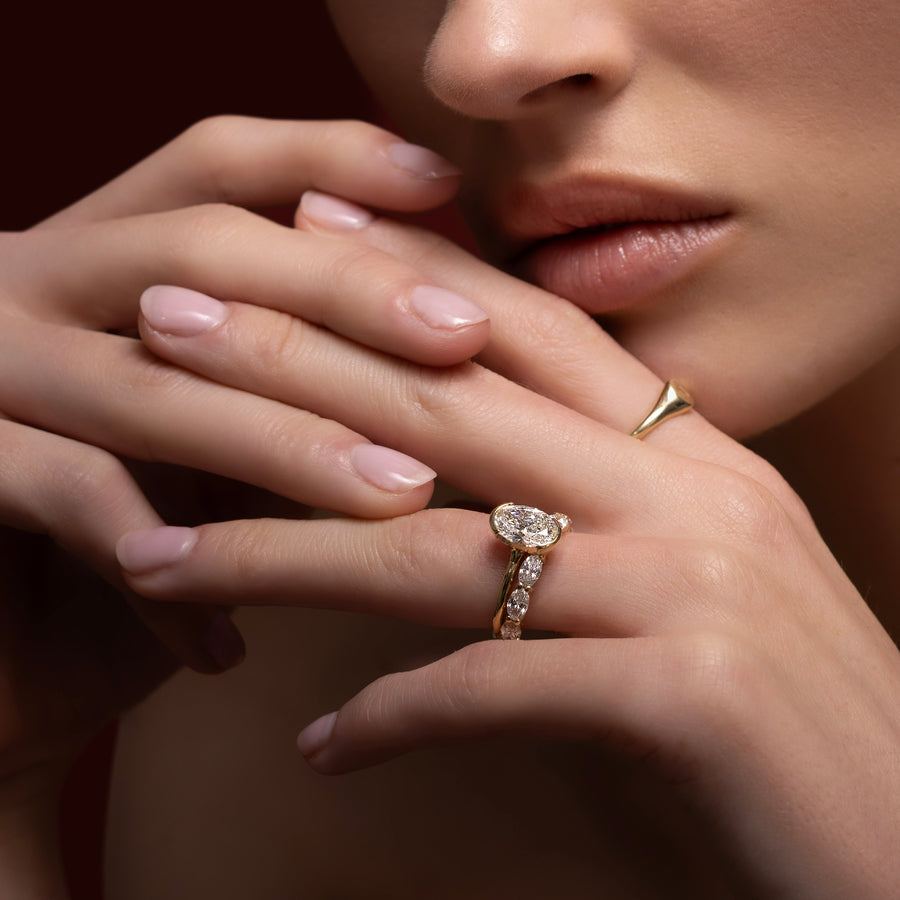 The Luise Ring® - Oval Half Bezel Solitaire