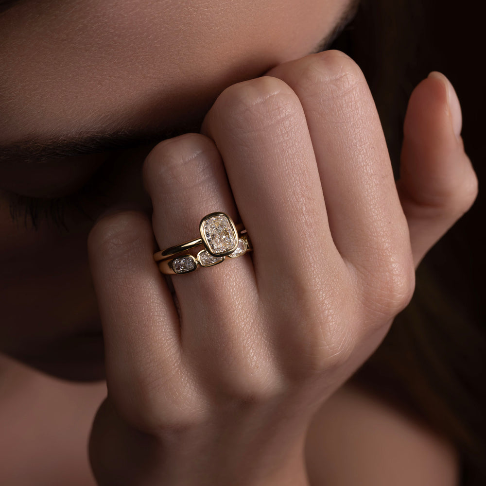 
                      
                        The Ophelia Ring - Elongated Cushion Bezel Solitaire
                      
                    
