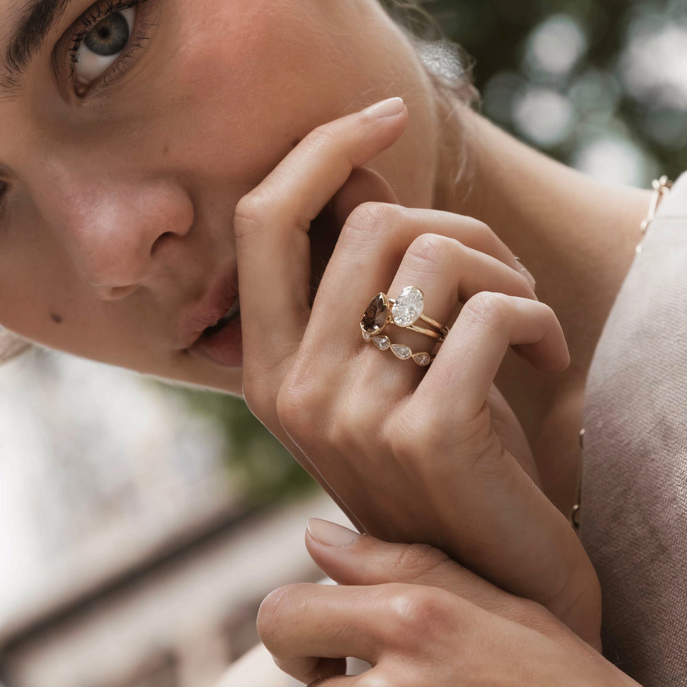 
                      
                        The Sophia Ring - Pear Half Bezel Solitaire
                      
                    