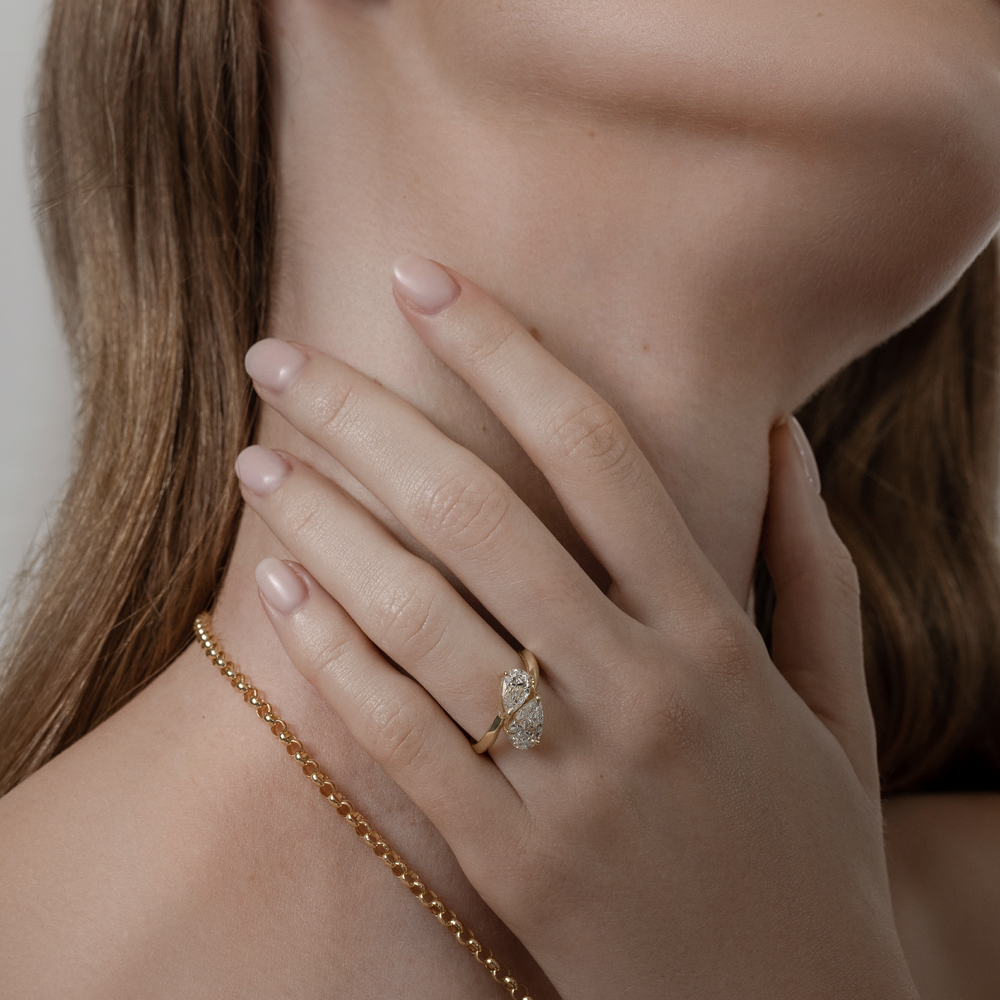 
                      
                        The Isabeau Ring - Twisted Knife Edge Pear Toi et Moi
                      
                    
