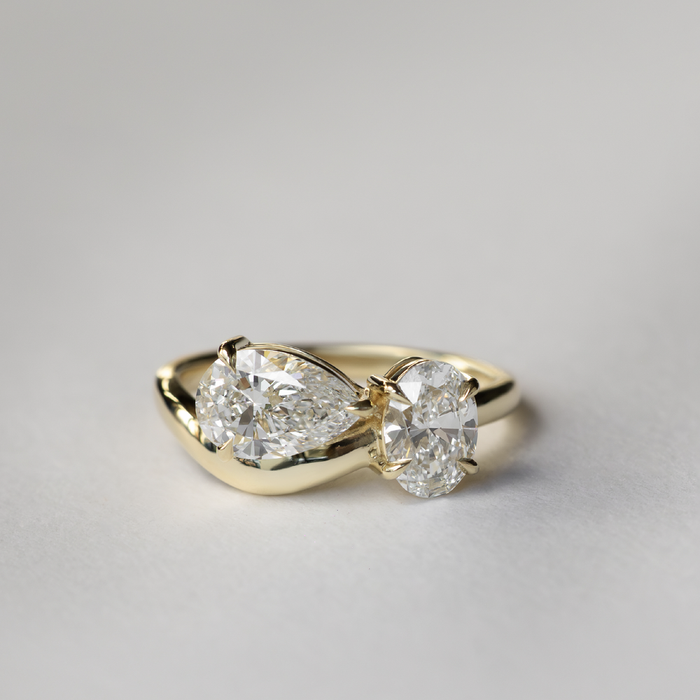 
                      
                        The Vivienne Ring - Oval and Pear Curved Toi et Moi
                      
                    