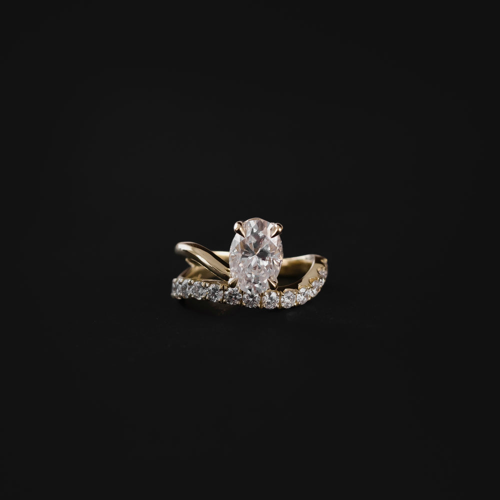 
                      
                        The Elijah Ring - Floating Oval Solitaire with Pavé Band
                      
                    