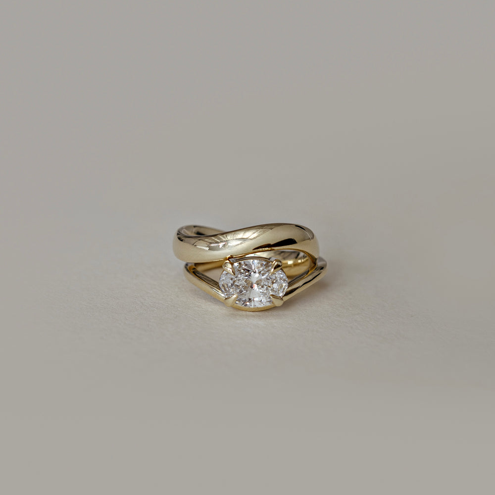 The Maya Ring - Oval Curved Solitaire