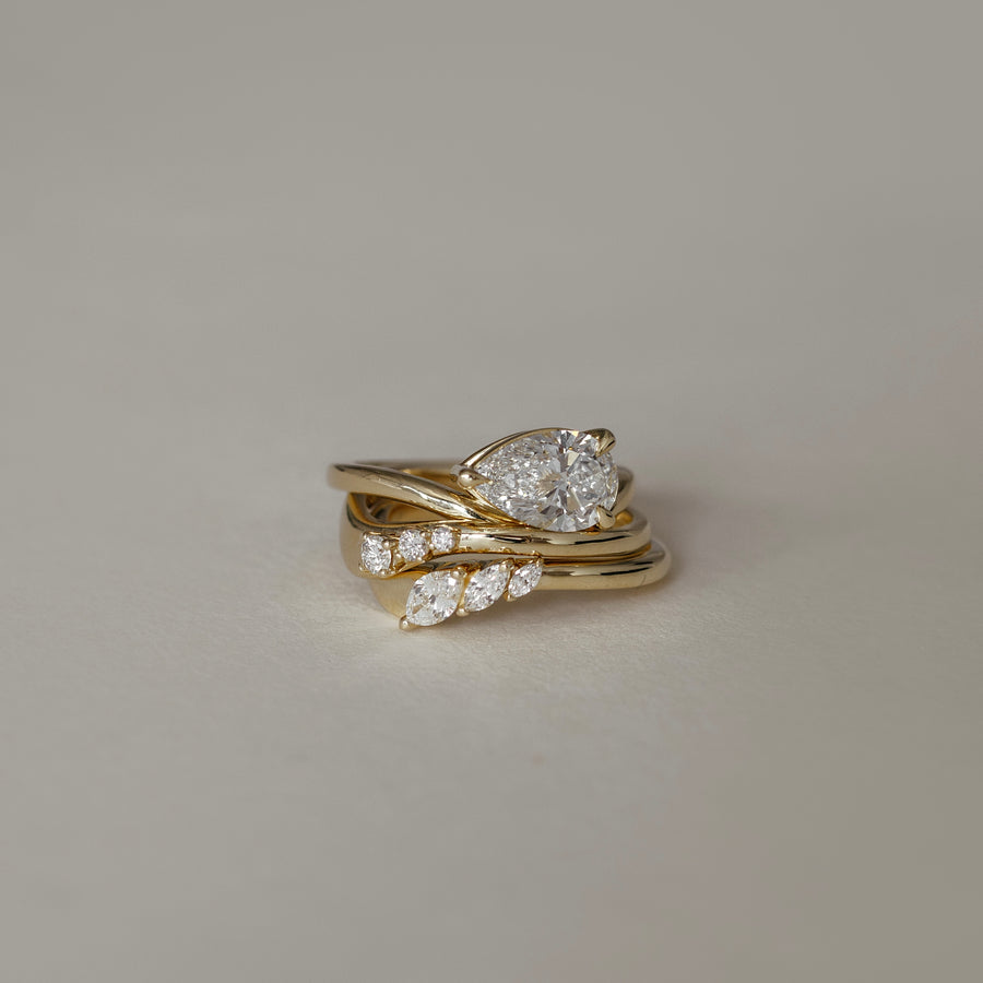 The Eve Ring - Curved Round Brilliant Wedding Ring
