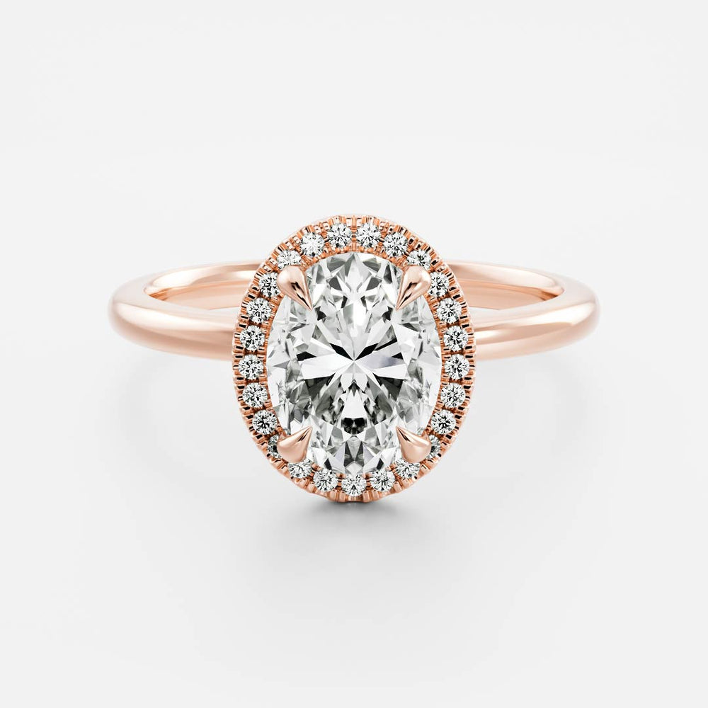 
                      
                        The Luise Ring™ - Oval Halo
                      
                    