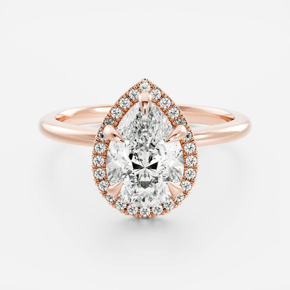 
                      
                        The Sophia Ring - Pear Halo
                      
                    