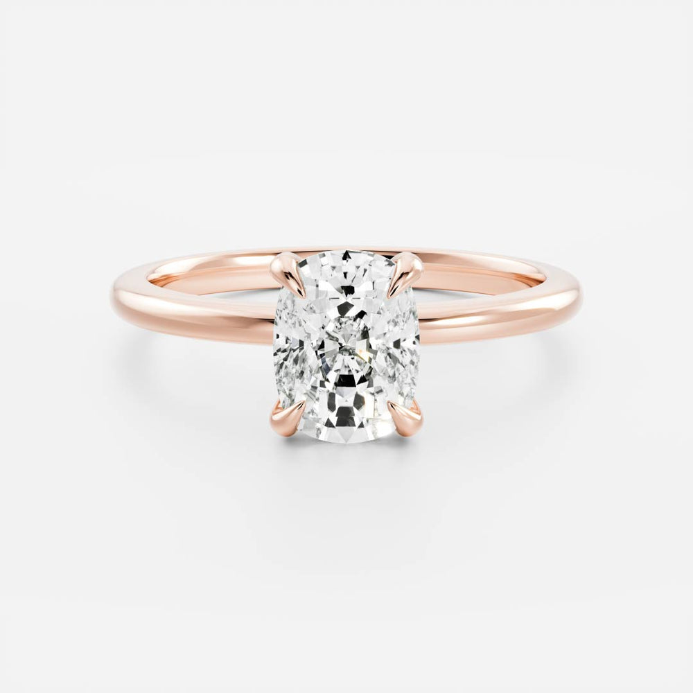 
                      
                        The Ophelia Ring - Elongated Cushion Solitaire
                      
                    
