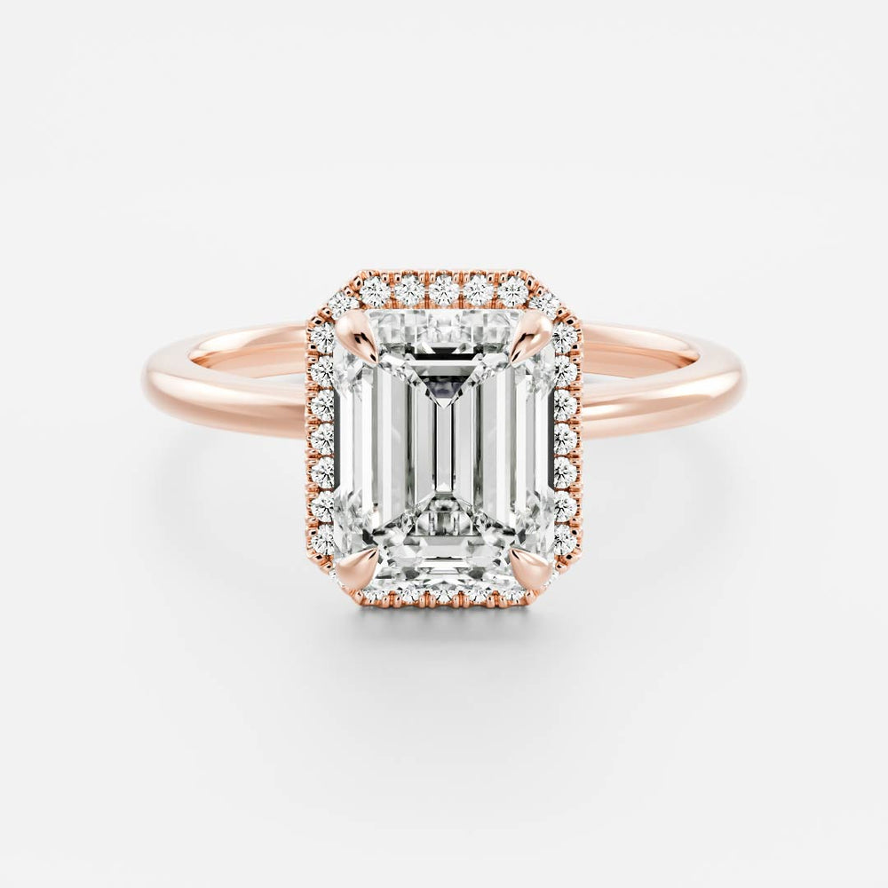 
                      
                        The Audrey Ring - Emerald Halo
                      
                    