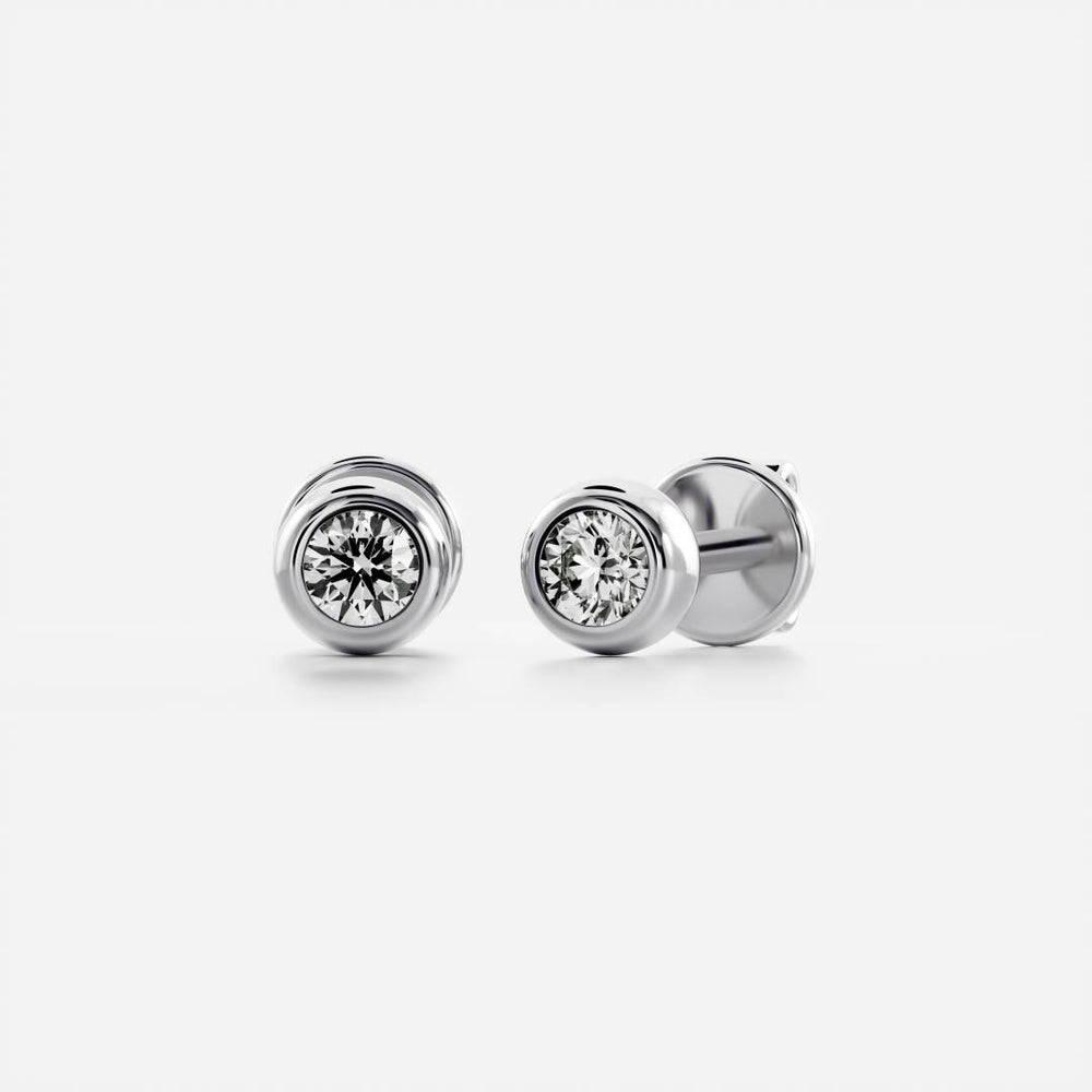 
                      
                        The Vera Earrings - Round Bezel Studs
                      
                    