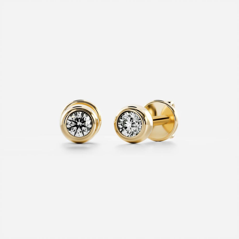 
                      
                        The Vera Earrings - Round Bezel Studs
                      
                    