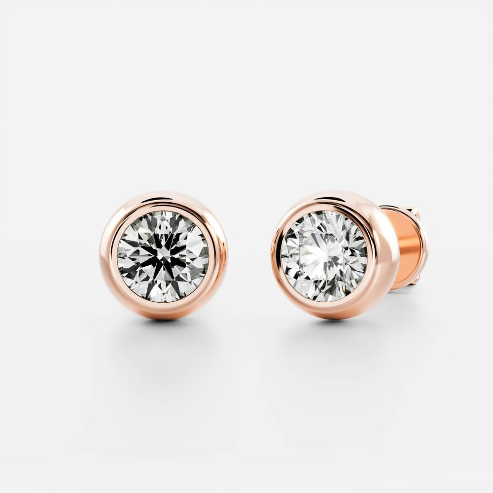 
                      
                        The Vera Earrings - Round Bezel Studs
                      
                    