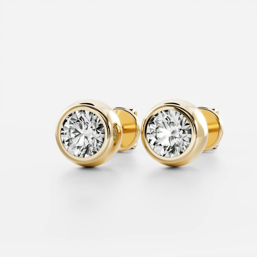 
                      
                        The Vera Earrings - Round Bezel Studs
                      
                    