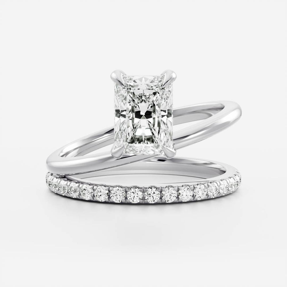 
                      
                        The Emerie Ring - Radiant Double Band Solitaire
                      
                    