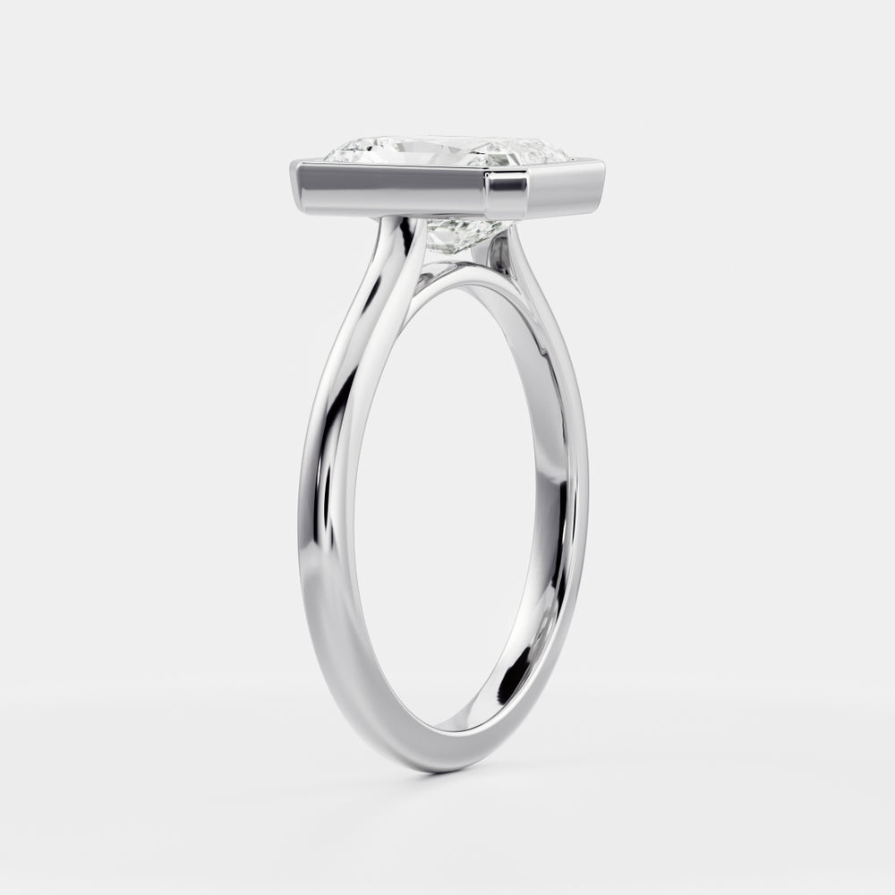 
                      
                        The Vienna Ring - Radiant Bezel Solitaire
                      
                    