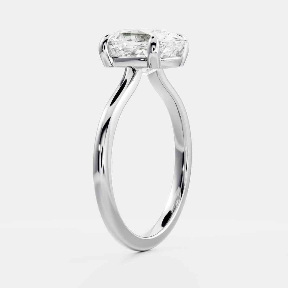 
                      
                        The Ophelia Ring - Elongated Cushion Solitaire
                      
                    