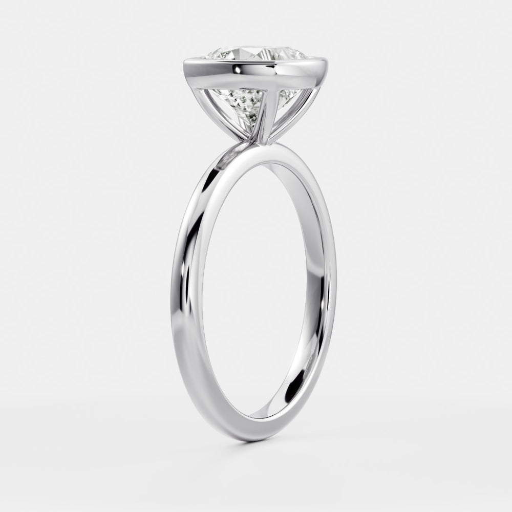 
                      
                        The Paloma Ring - Cushion Bezel Solitaire
                      
                    