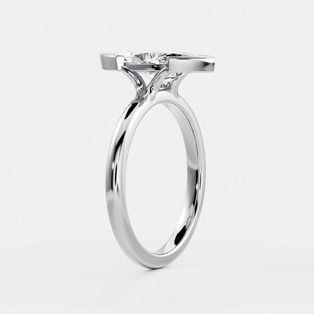 
                      
                        The Arie Ring - Marquise Half Bezel Solitaire
                      
                    