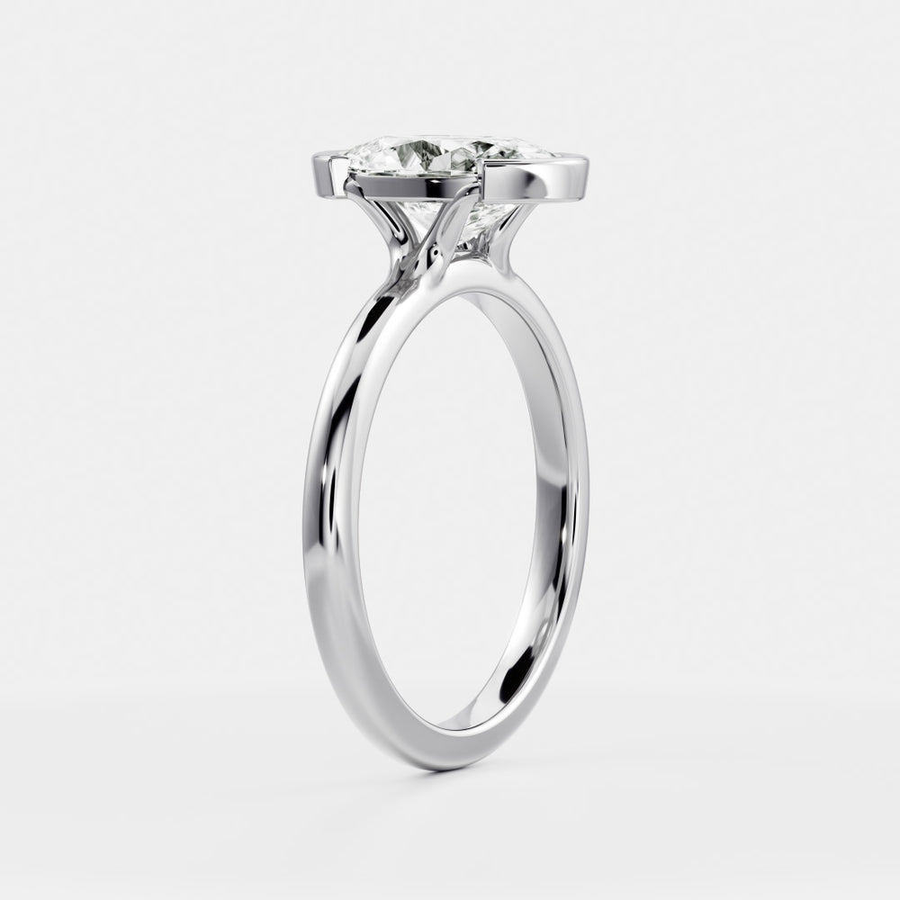 
                      
                        The Luise Ring - Oval Half Bezel Solitaire
                      
                    