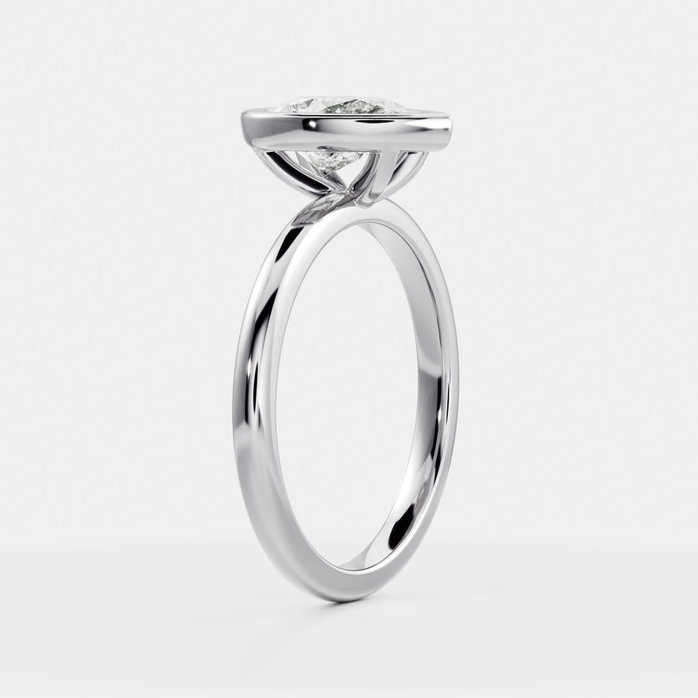 
                      
                        The Sophia Ring - Pear Bezel Solitaire
                      
                    