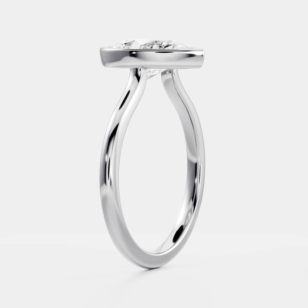 
                      
                        The Sophia Ring - Pear Bezel Solitaire
                      
                    