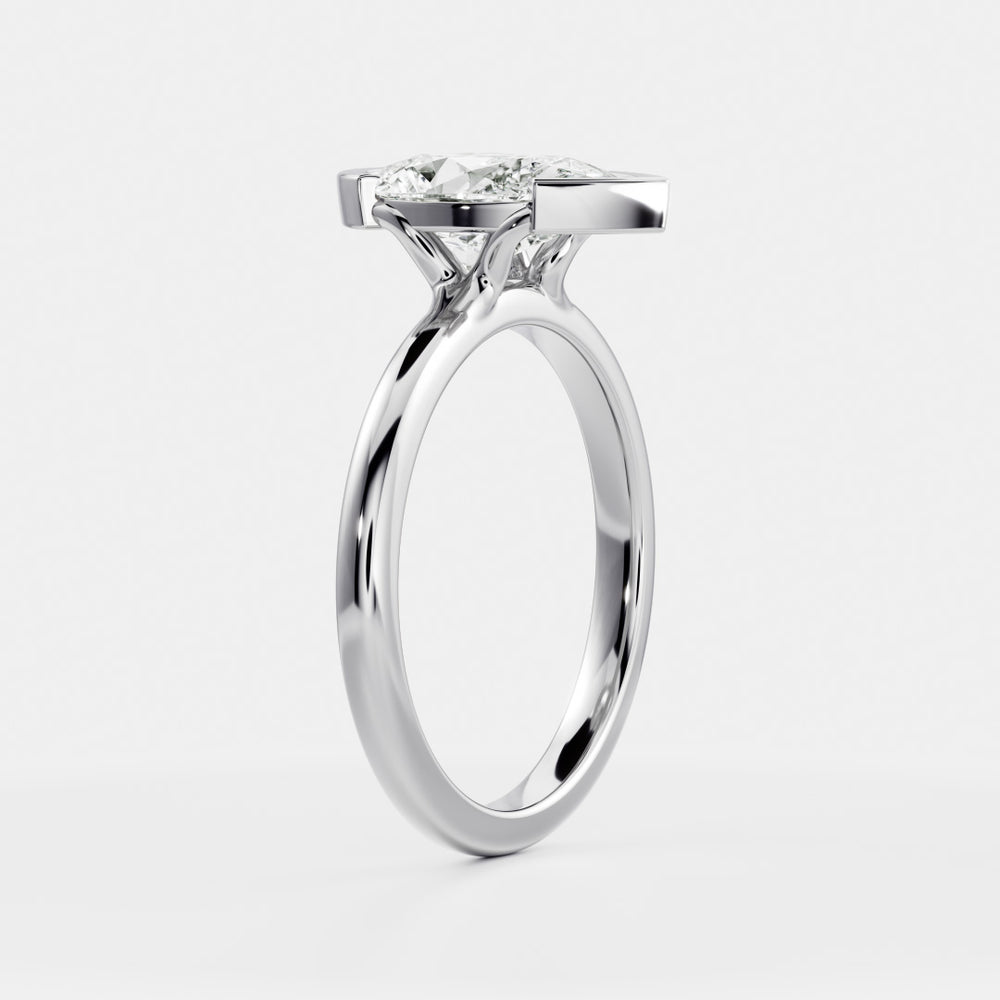
                      
                        The Sophia Ring - Pear Half Bezel Solitaire
                      
                    